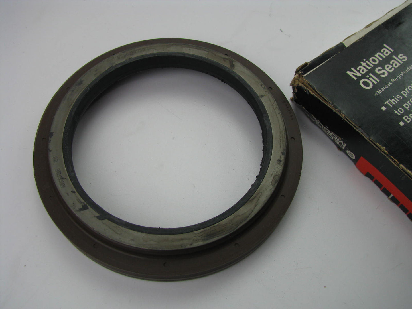 National 370215A Wheel Seal - 7.015'' OD X 5.000'' ID X 1.130'' Wide