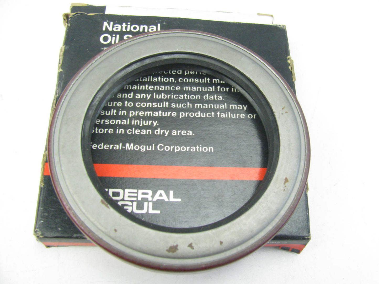 National 415009N Wheel Seal - 3.8765'' OD X 2.7500'' ID X 0.468'' Wide