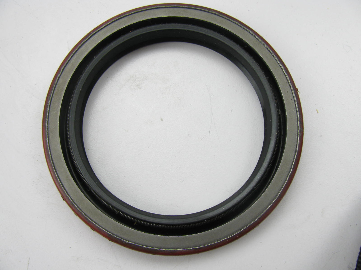 National 415302 Oil Seal - 3.500'' OD X 2.562'' ID X 0.375'' Wide