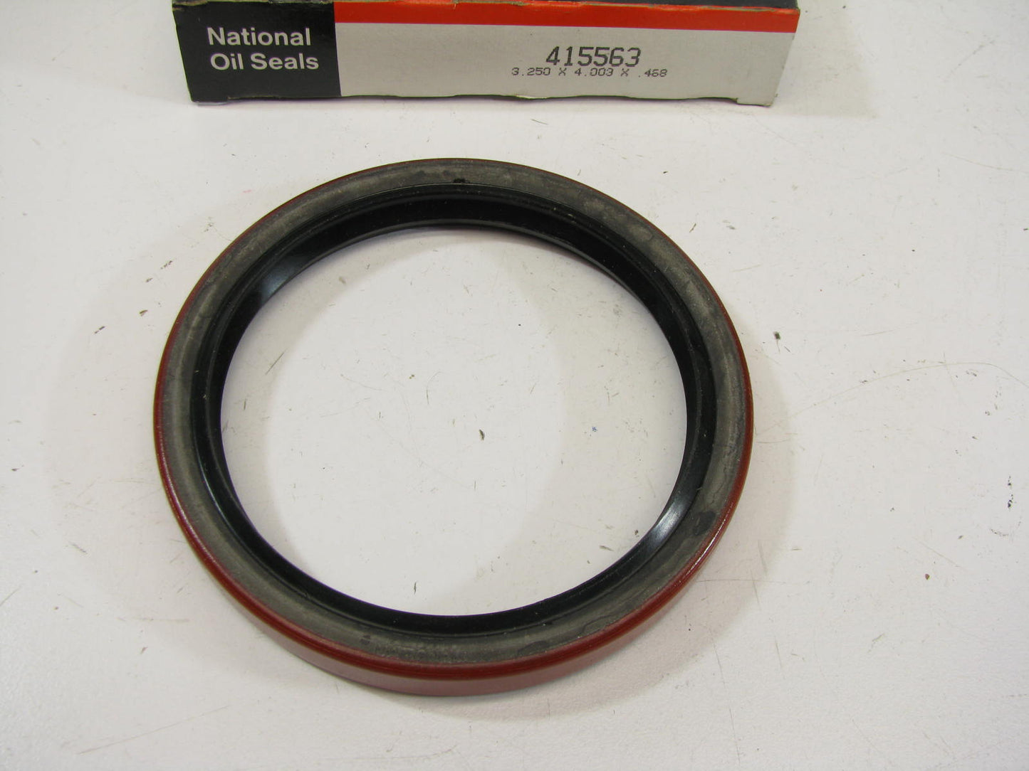 National 415563 Oil Seal - 4.003'' OD X 3.250'' ID X 0.468'' Wide
