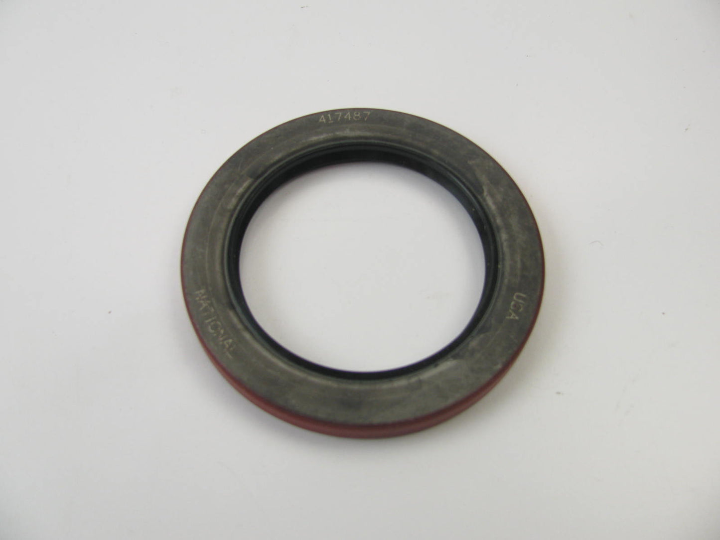 National 417487 Wheel Seal - 4.249'' OD X 3.000'' ID X 0.437'' Wide