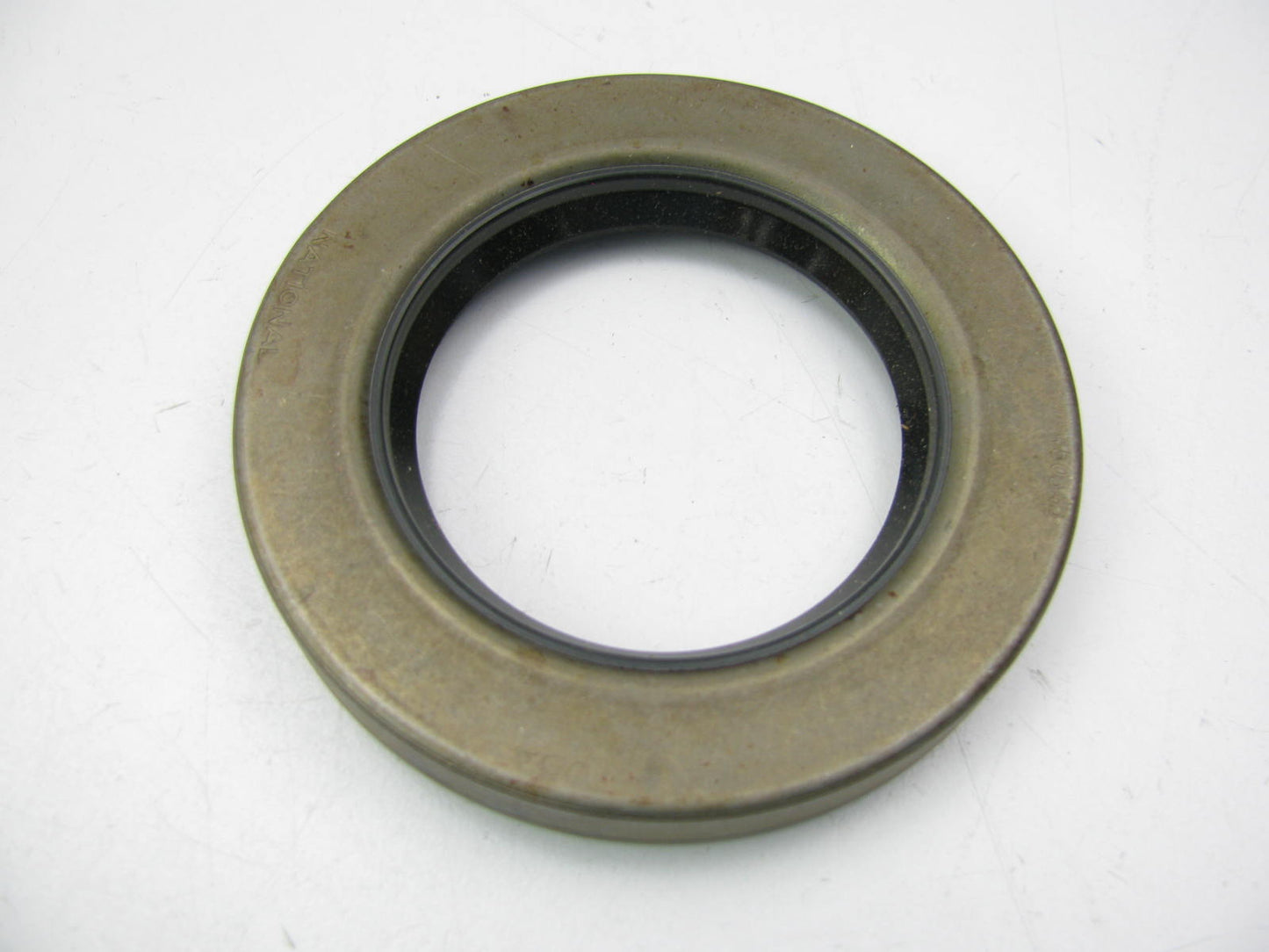 National 450343 Oil Seal - 3.371'' OD X 2.062'' ID X 0.468'' Wide