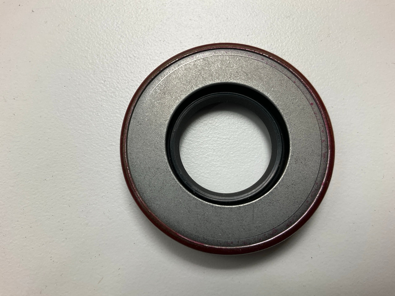 National 453165 Wheel Oil Seal - 2.066'' OD X 1.000'' X 0.375'' Wide