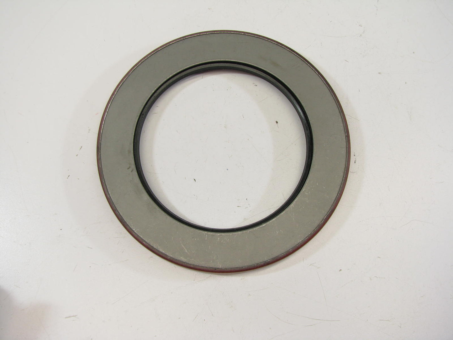 National 456618 Rear Wheel Oil Seal - 5.690'' OD X 3.880'' ID X 0.500'' Wide