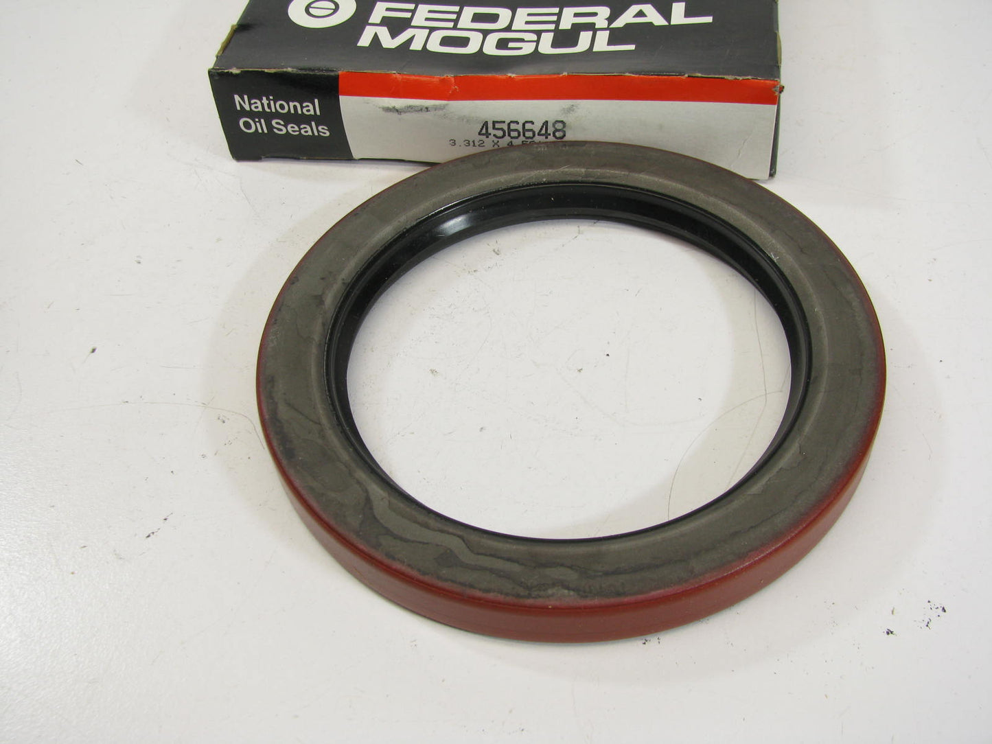 National 456648 Rear Inner Wheel Seal - 4.501'' OD X 3.312'' ID X 0.468'' Wide