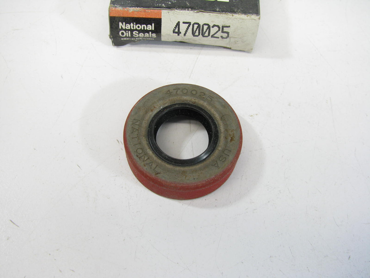 National 470025 Oil Seal - 1.379'' OD X 0.687'' ID X 0.250'' Wide