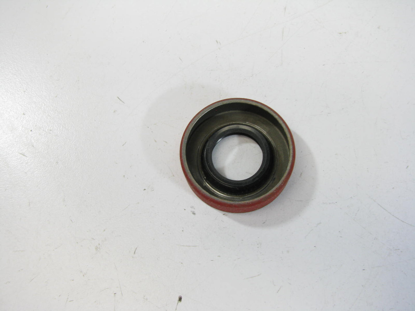 National 470025 Oil Seal - 1.379'' OD X 0.687'' ID X 0.250'' Wide