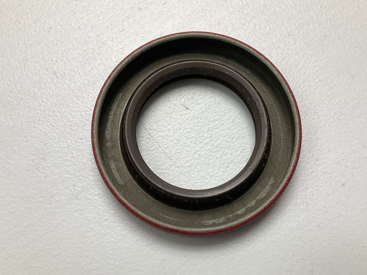 National 471649V Wheel Oil Seal - 1.628'' OD X 1.000'' ID X 0.250'' Wide