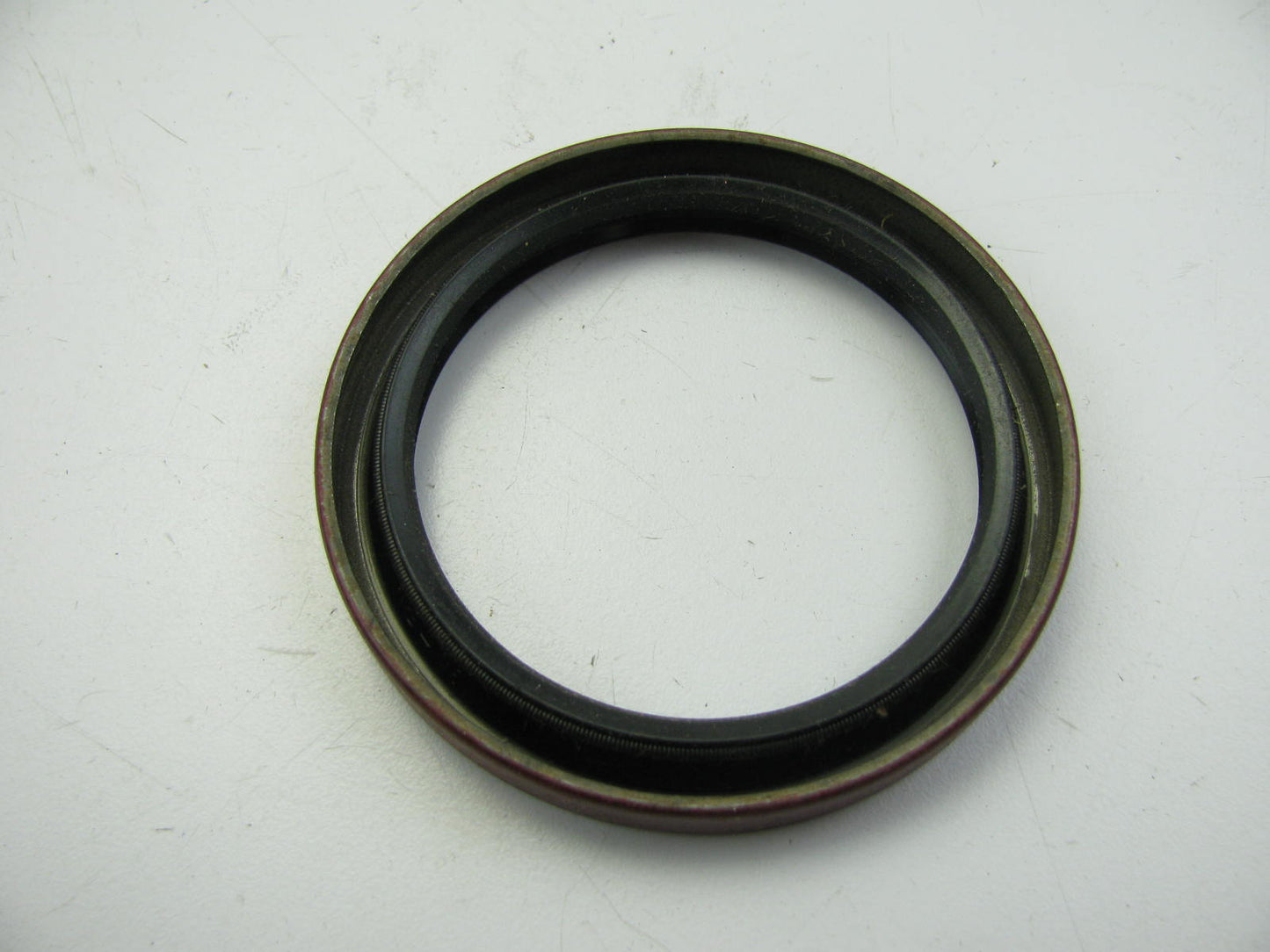 National 471887 Oil Seal - 3.1300'' OD X 2.4375'' ID X 0.3750'' Wide