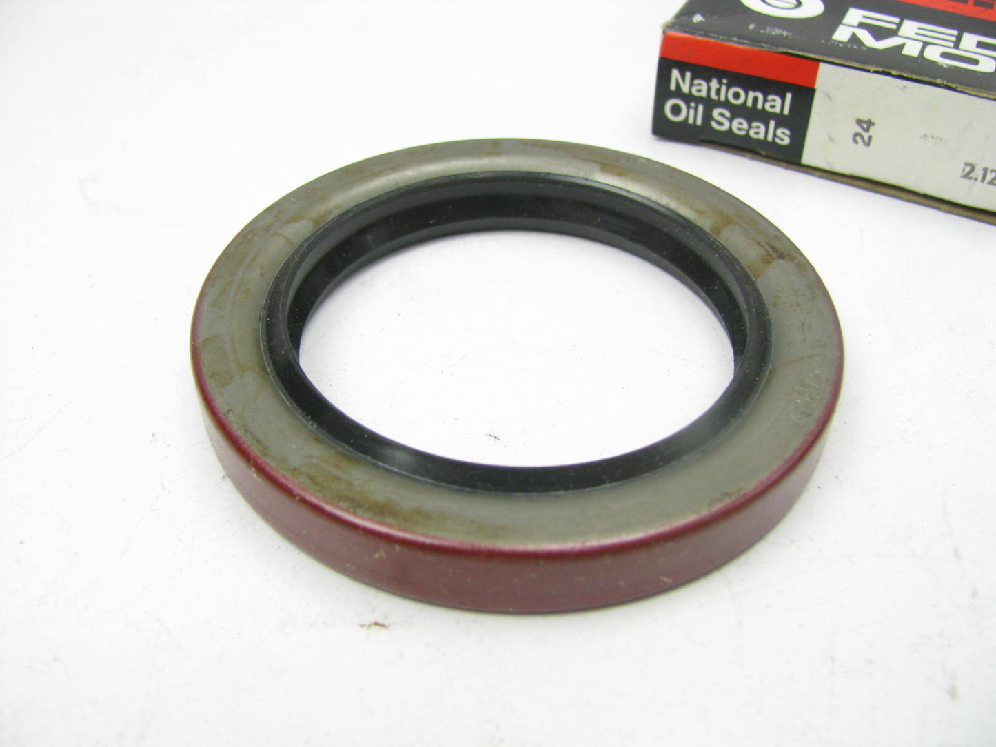 National 473467 Wheel Seal - 2.296'' OD X 2.125'' ID X 0.375'' Wide