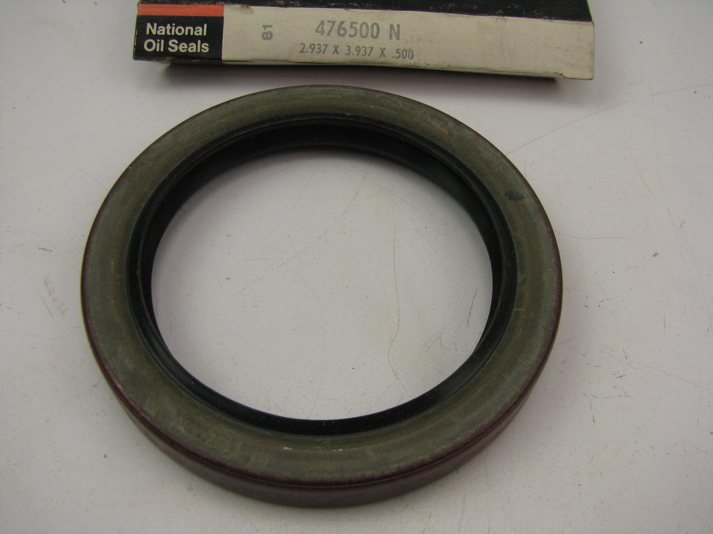 National 476500 Differential Pinion Seal - 3.937'' OD X 2.937'' ID X 0.500'' Wide