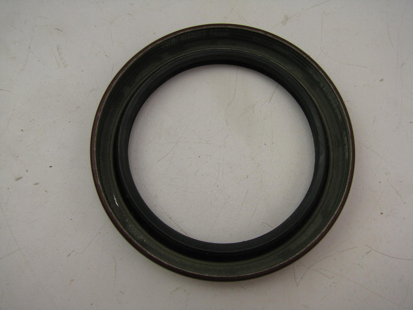 National 476500 Differential Pinion Seal - 3.937'' OD X 2.937'' ID X 0.500'' Wide