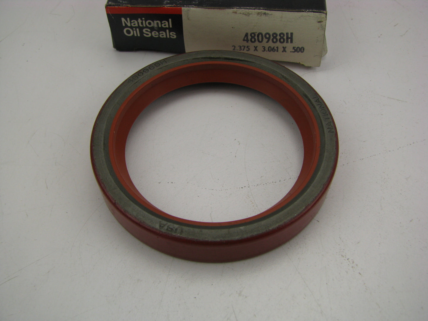 National 480988H Silicone Oil Seal - 3.0660'' OD X 2.3750'' ID X 0.500'' Wide