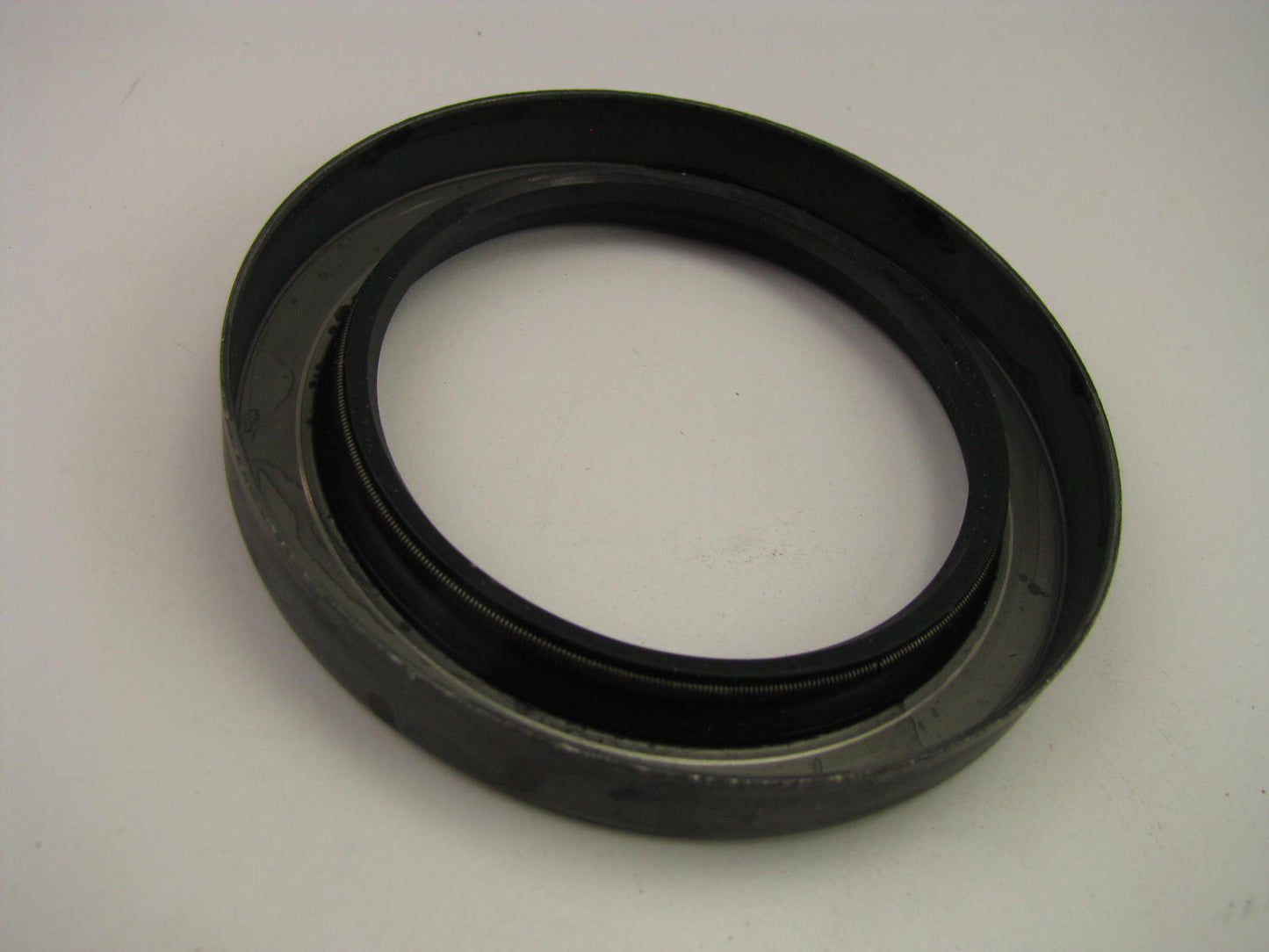 National 486857 Oil Seal - 3.812'' OD X 2.648'' ID X 0.500'' Wide