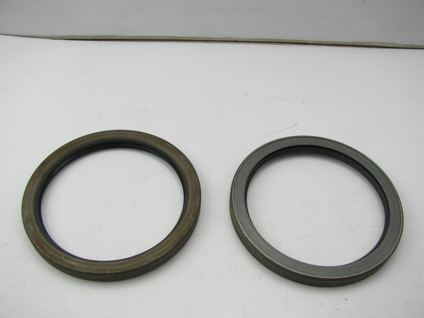 National 55107S Oil Seal - 7.008'' OD X 5.750'' ID X 0.562'' Wide - 2/Pack