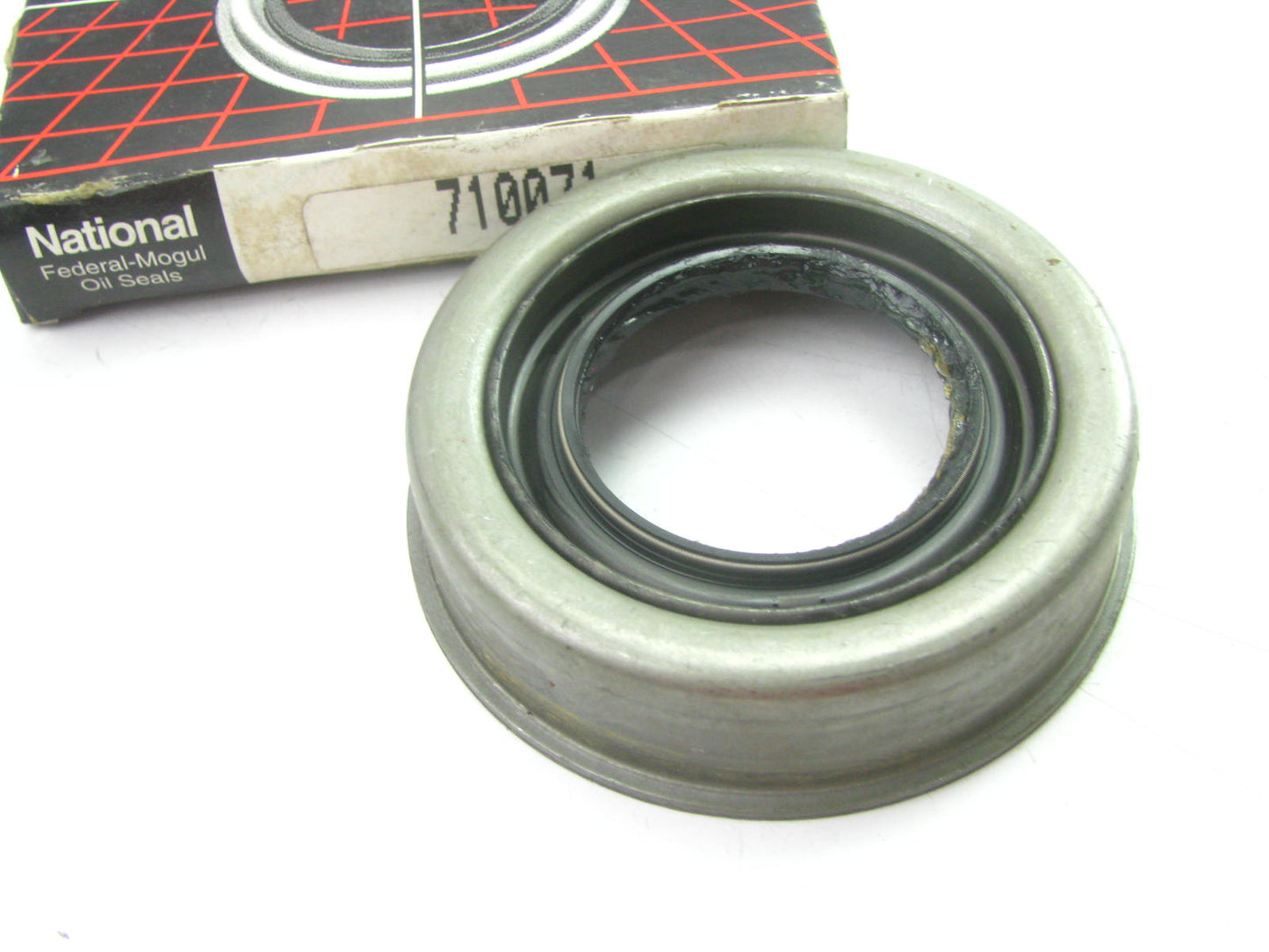 National 710071 Axle Shaft Seal - Front 2.84'' OD X 1.969'' ID X 0.57'' Wide