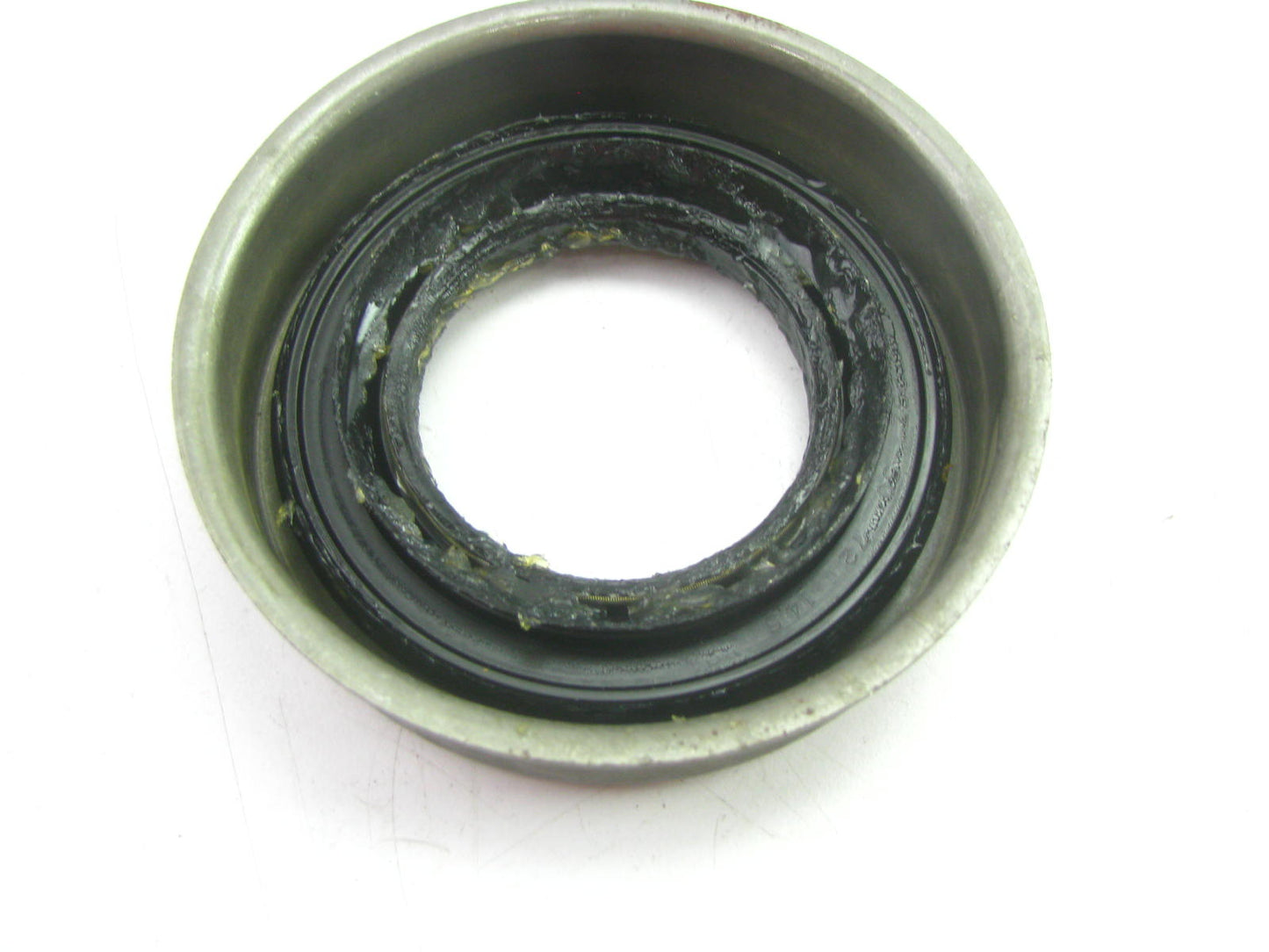 National 710071 Axle Shaft Seal - Front 2.84'' OD X 1.969'' ID X 0.57'' Wide