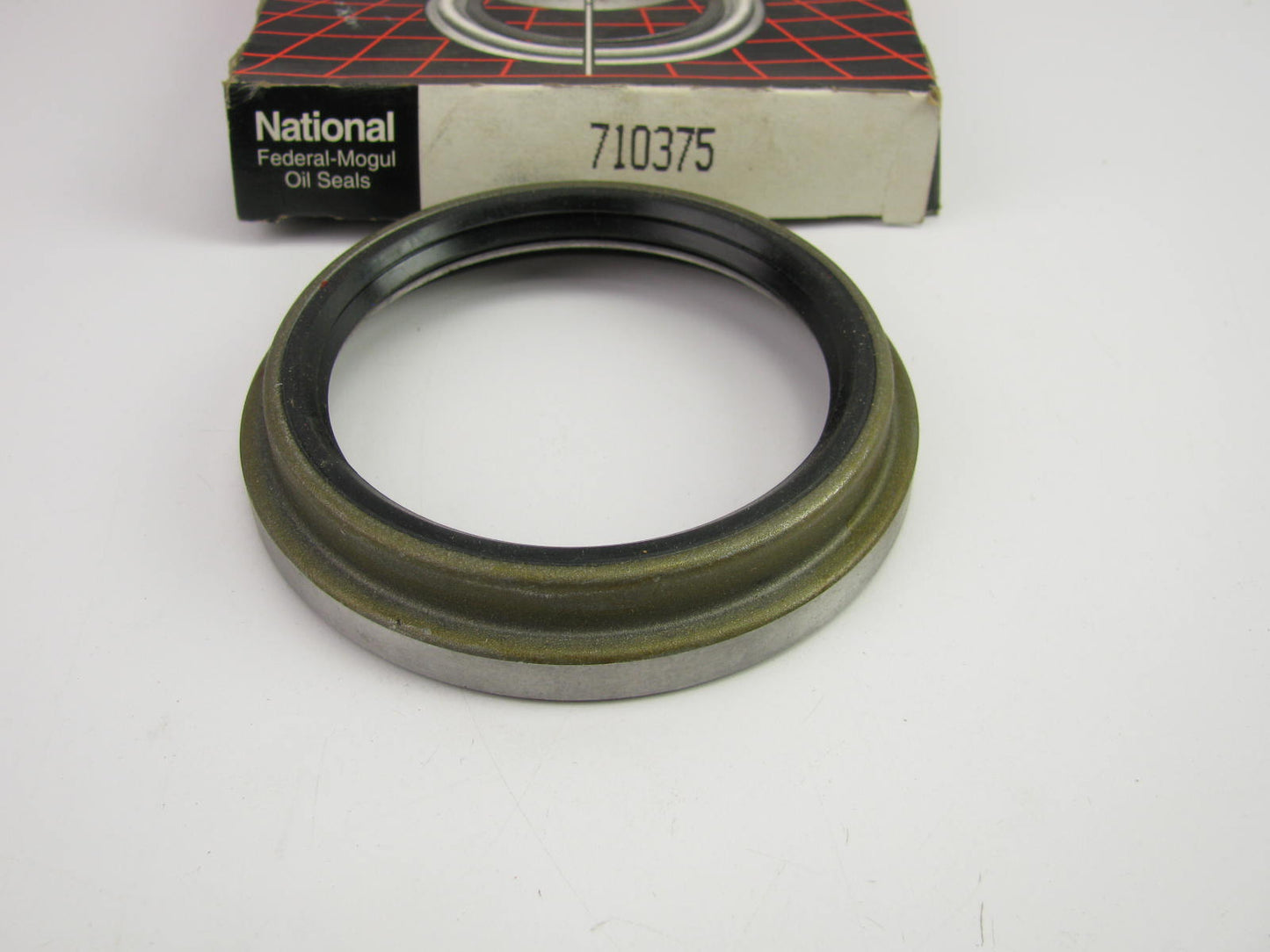 National 710375 Oil Seal - 4.024'' OD X 2.992'' ID X 0.374'' Width