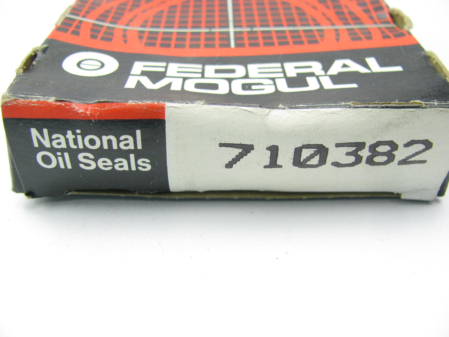 National 710382 Wheel Seal - 2.606'' OD X 2.205'' ID X 0.669'' Wide