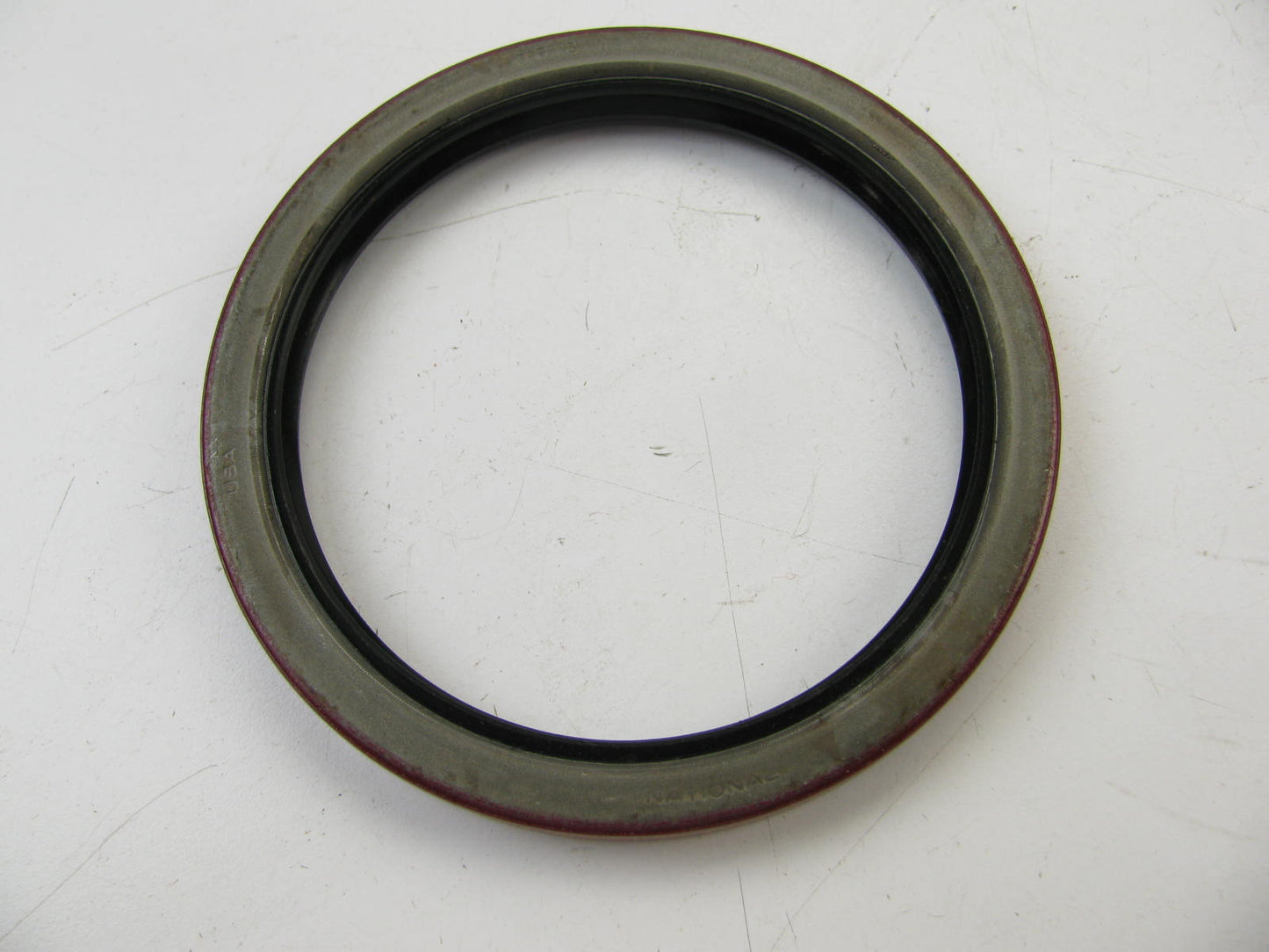 National 717003 Industrial Oil Seal - 4.875'' X 3.937'' ID X 0.500'' Wide