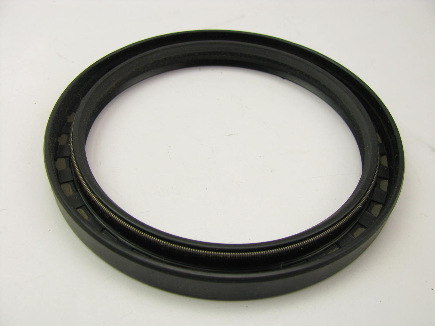 National 85X105X10 Multi-Lip Oil Seal W/ Spring - 4.145''ODX 3.346''IDX .394''Wide