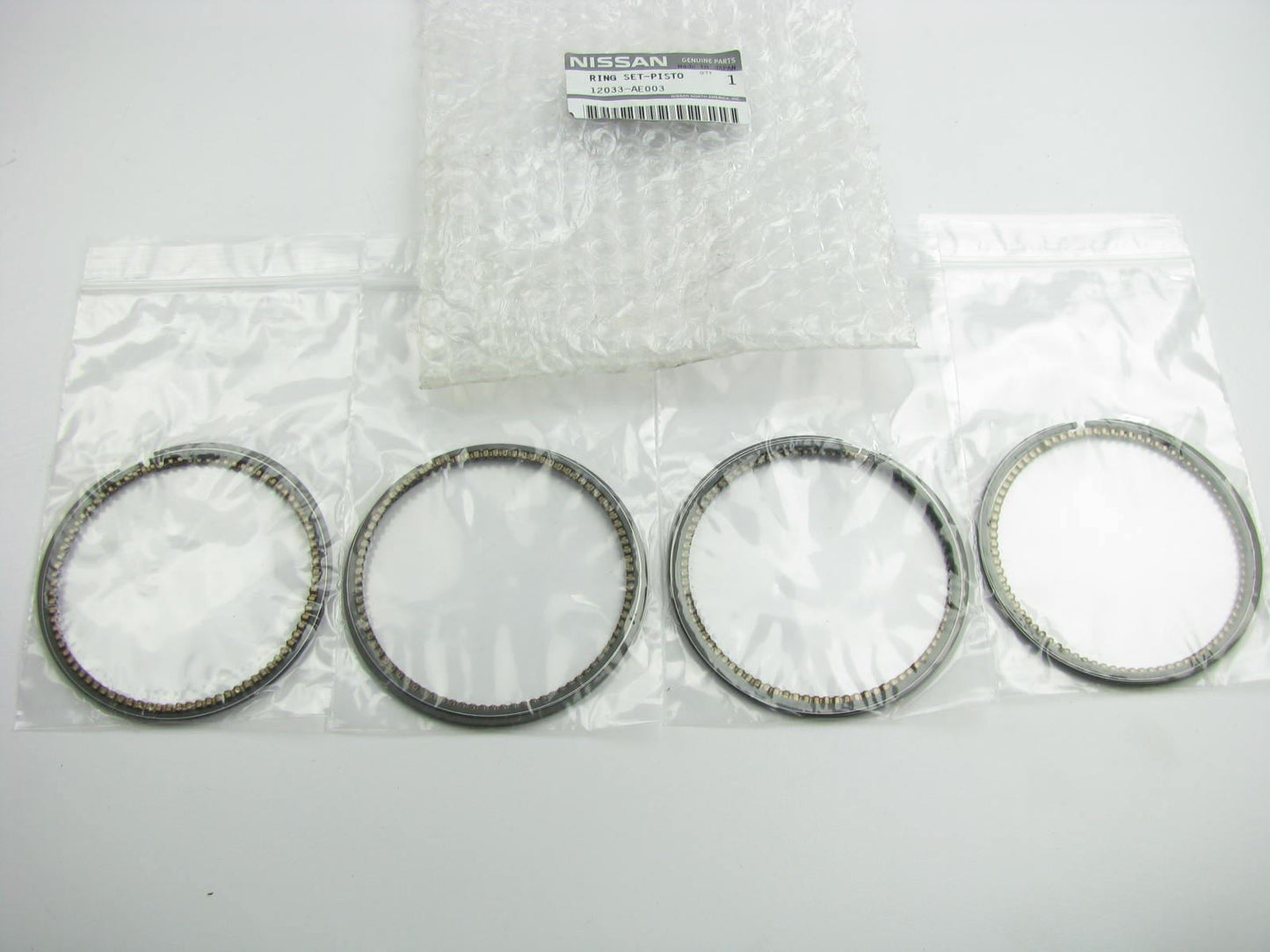 NEW QR25DE 2.5L Engine Piston Rings - STANDARD SIZE - OEM For Nissan 12033-AE003