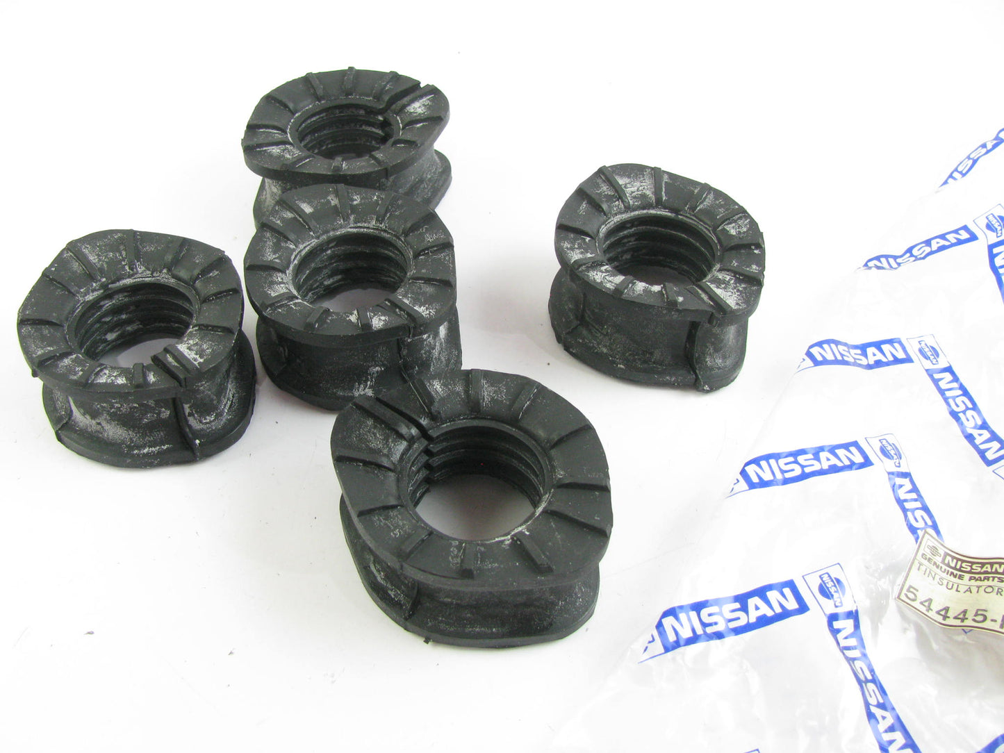 (x5) NOS OEM LEFT Rack   Bushing Insulator 54445-N3401 For 74-78 280Z, 260Z
