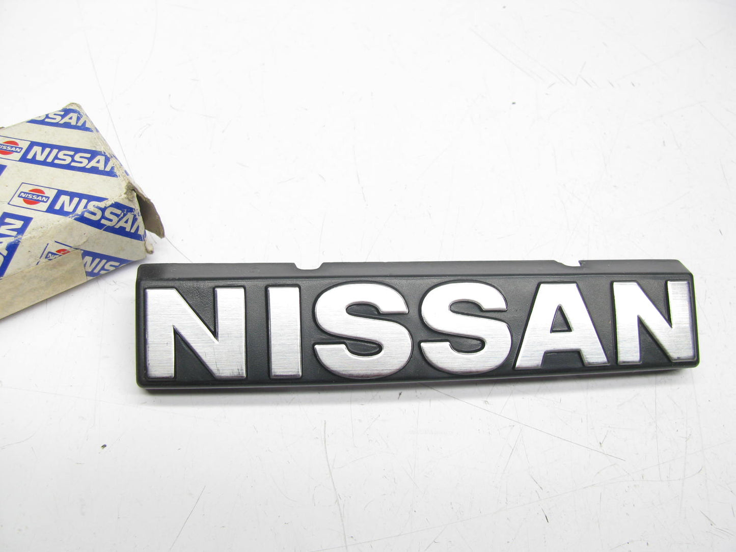 NEW - OEM 62394-D1600 Front Grille Emblem For 1982-1984 Nissan Stanza
