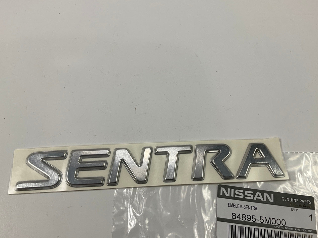 NEW GENUINE Rear Trunk Lid Sentra Emblem OEM For 00-04 Nissan Sentra 84895-5M000