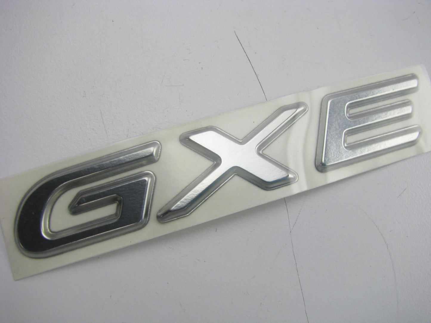 New OEM Trunk Lid *GXE* Badge Emblem Nameplate For 98-01 Altima 848969E400