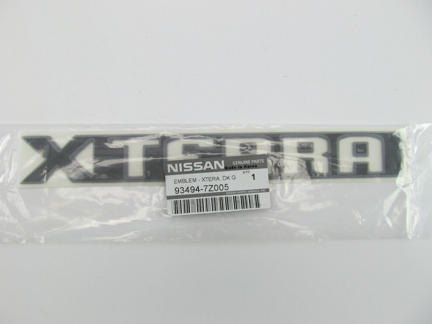 NEW GENUINE Dark Gray Liftgate Emblem For 2000-2001 Nissan Xterra 93494-7Z005