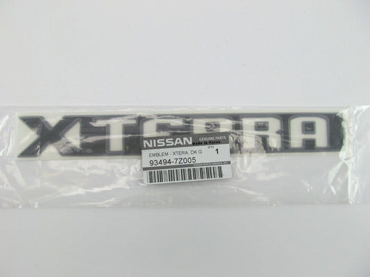 NEW GENUINE Dark Gray Liftgate Emblem For 2000-2001 Nissan Xterra 93494-7Z005