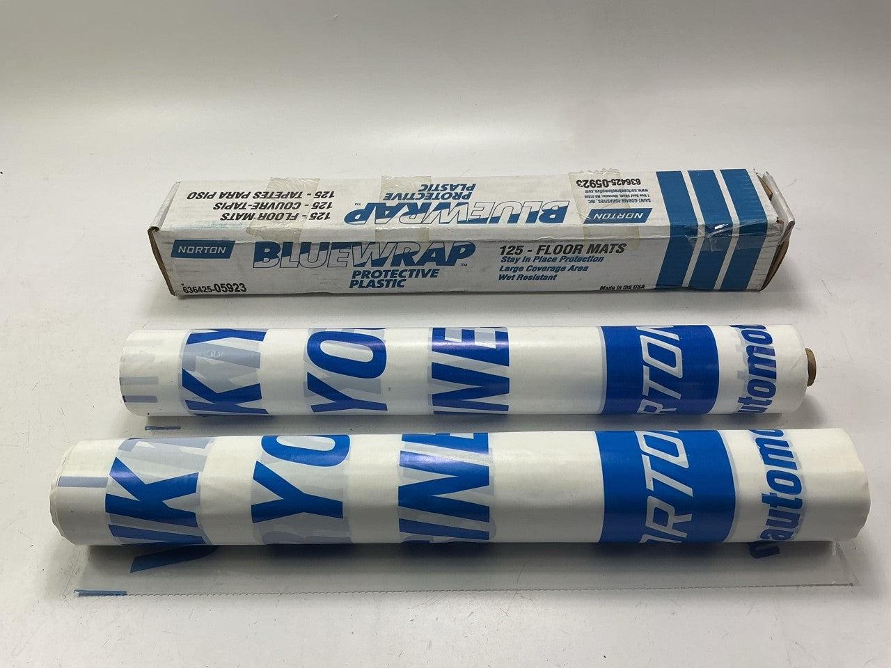 (2) Packs Of 125 Each - Norton 05923 Blue Wrap 16-1/2''x21'' Protective Floor Mats