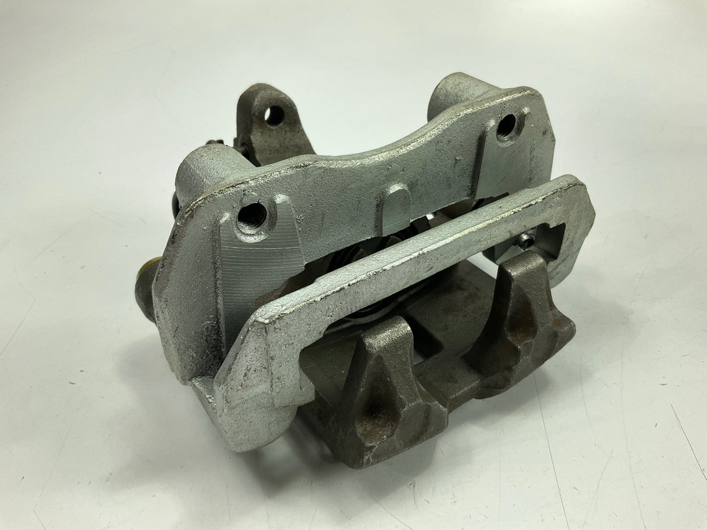 MISSING PARKING BRAKE BRACKET - REMAN. Nugeon 99-01161BRear Left Brake Caliper
