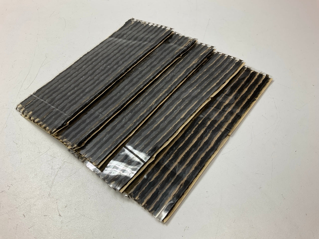 (50) Parts Master 5040219 - 7-1/4'' Thin, Black String Tire Repair