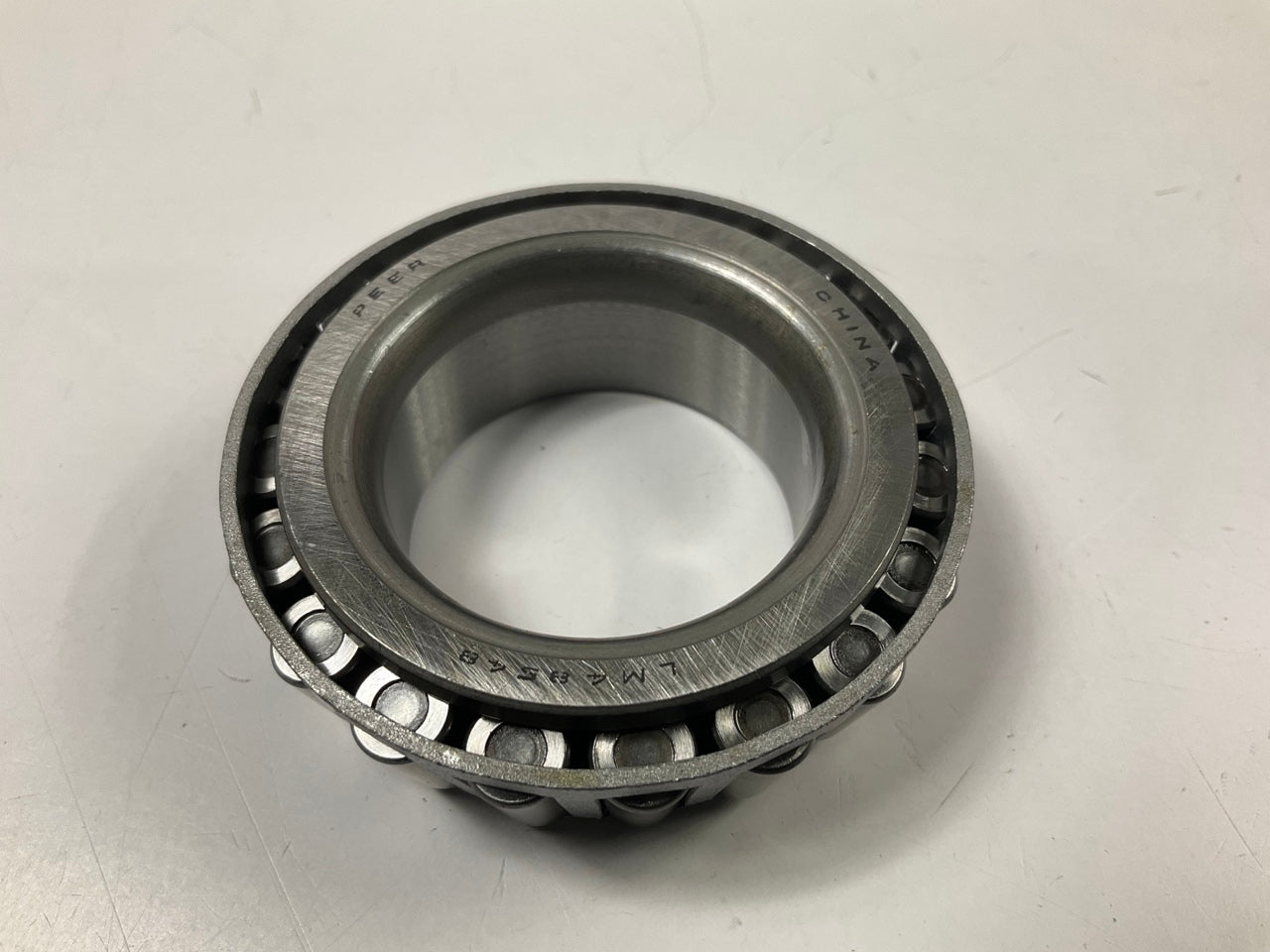 (2) Peer LM48548 Front Outer Wheel Bearings