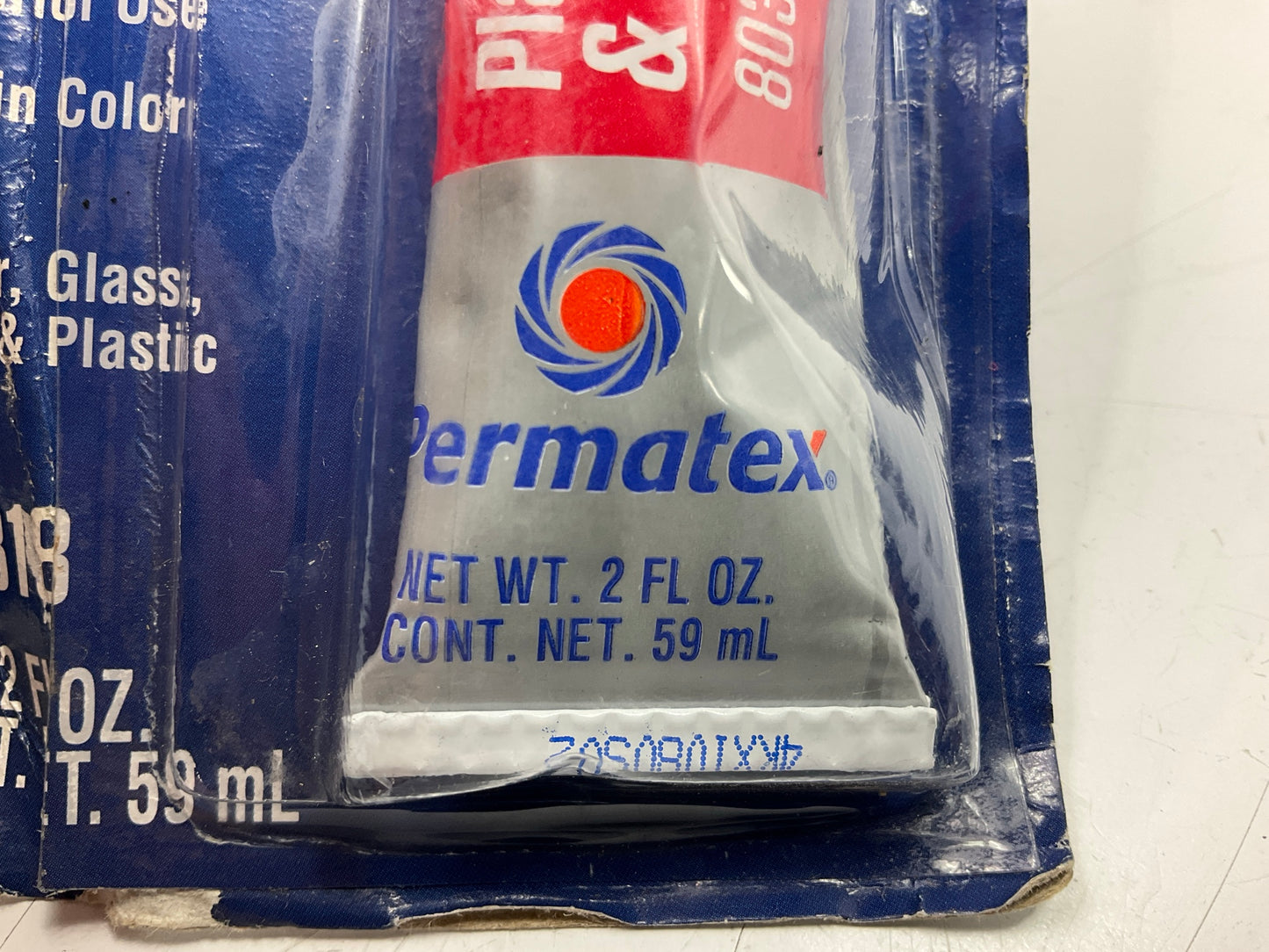 Permatex 80318 Emblem And Trim Adhesive - 2 Oz Squeeze Tube