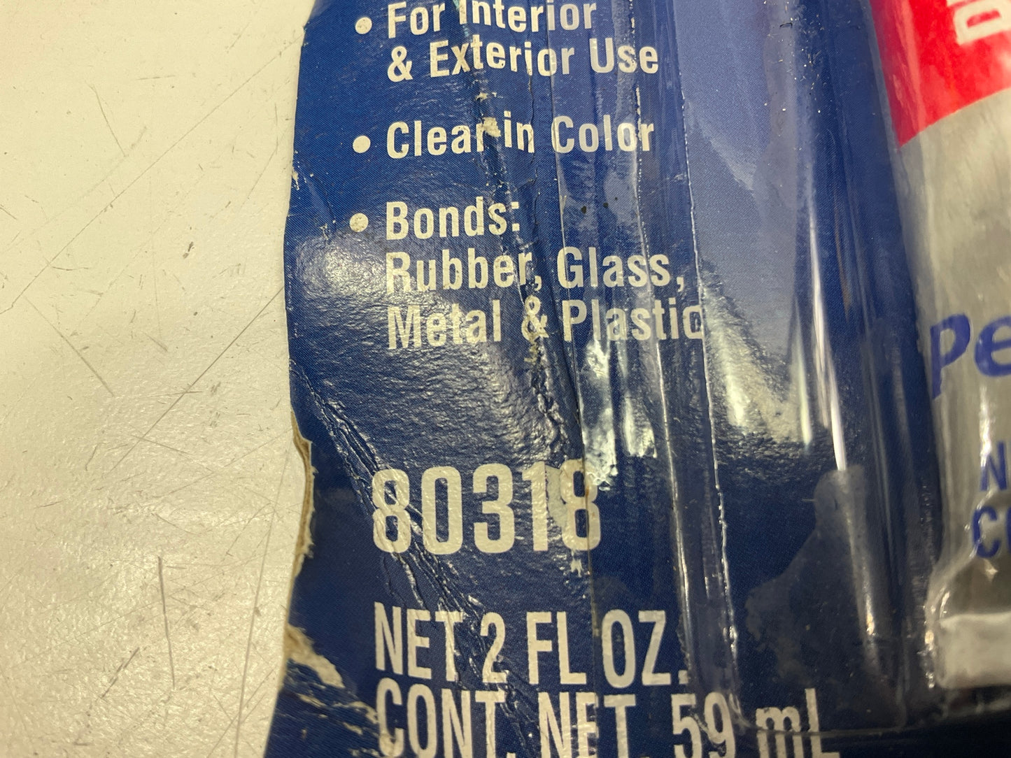 Permatex 80318 Emblem And Trim Adhesive - 2 Oz Squeeze Tube