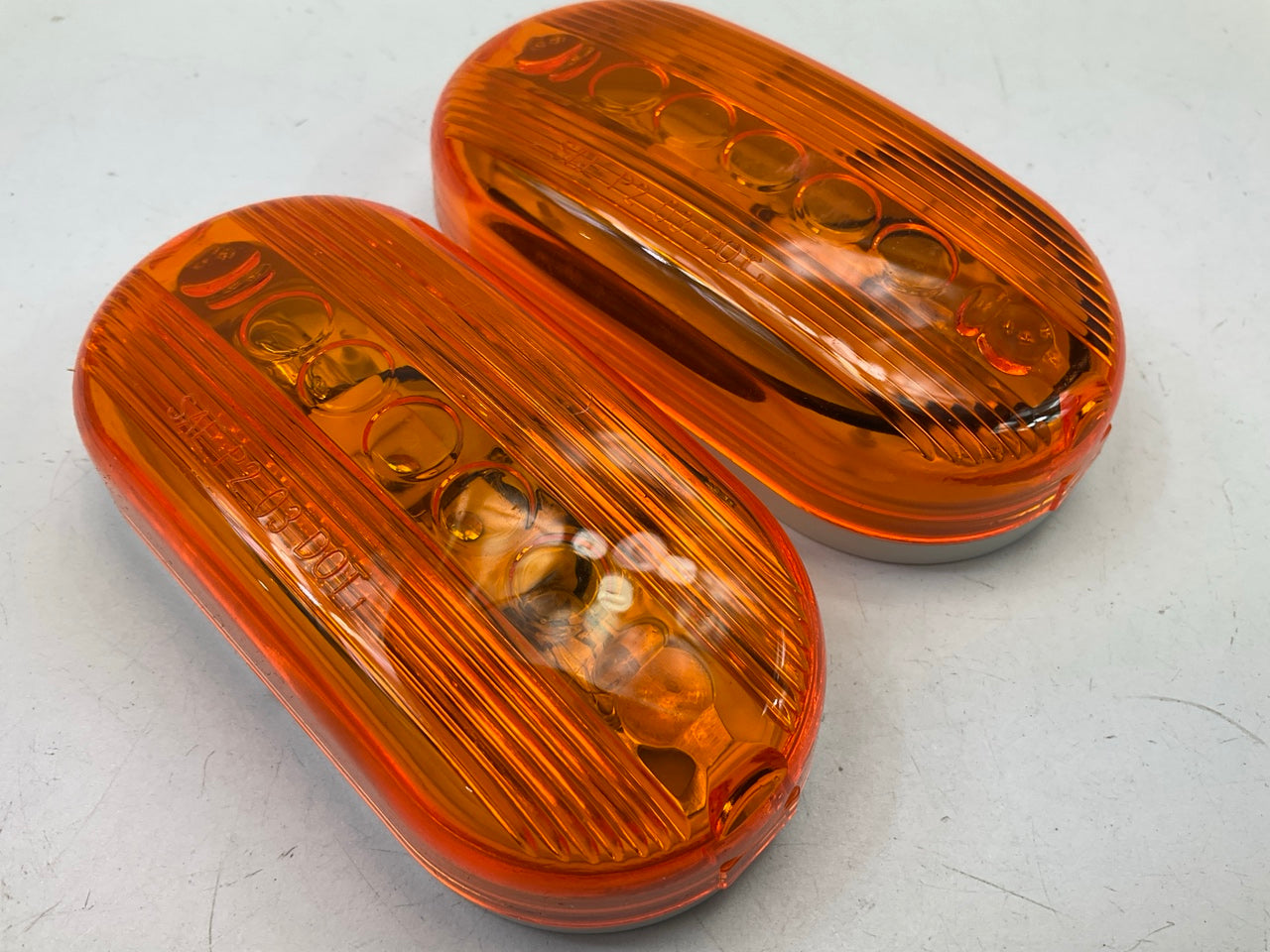 (2) Pilot NV5005A 4'' Amber Oval Surface Mount Clearance Side Marker Light