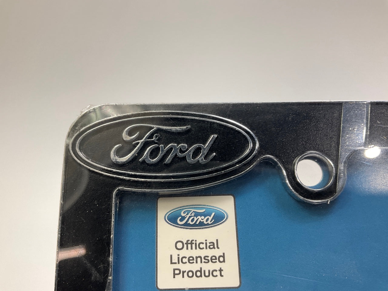 Plasticolor 42528 Ford Built Tough License Plate Frame Chrome, Black Metal