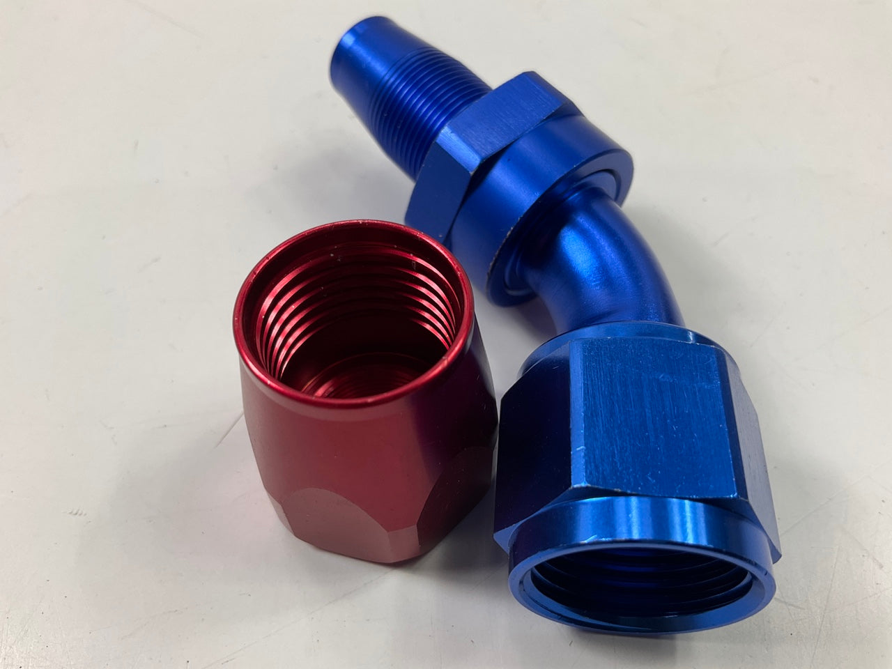 Russell 610110 10AN ProClassic Swivel 45 Degree Hose End With Red/Blue Finish