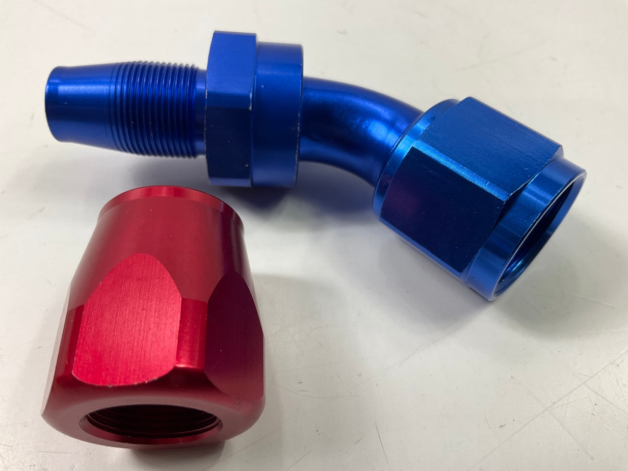 Russell 610110 10AN ProClassic Swivel 45 Degree Hose End With Red/Blue Finish
