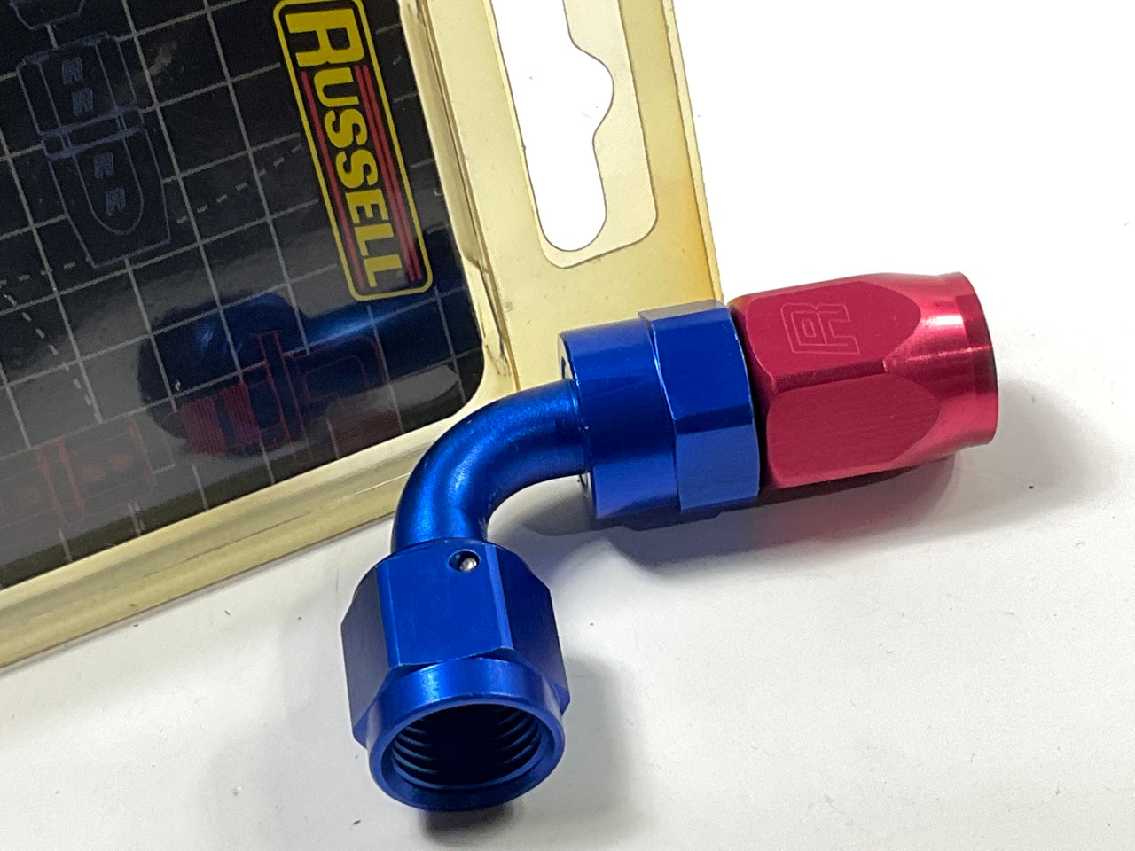 Russell 610160 Red / Blue Anodized Aluminum -6AN 90-Degree Hose End
