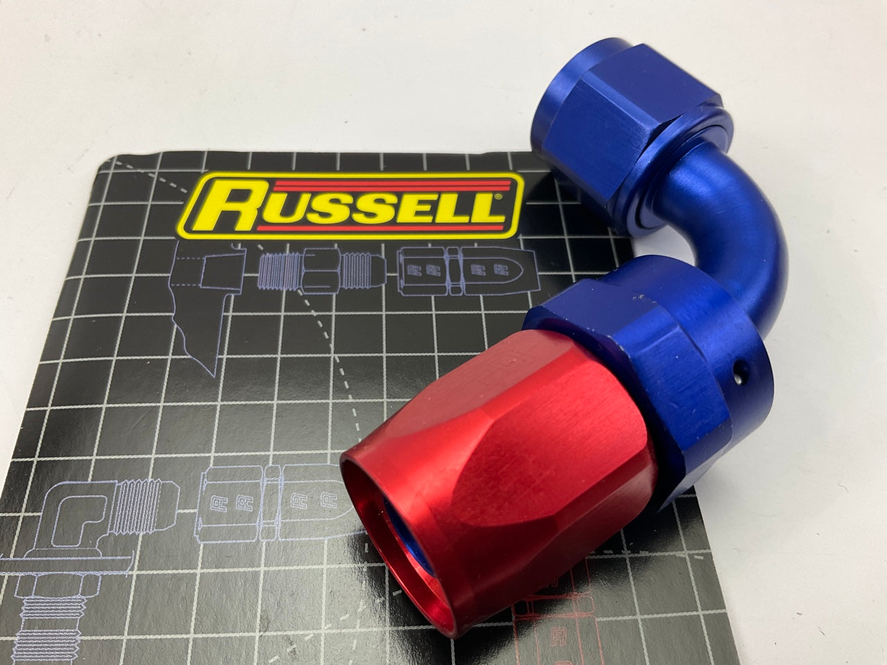 Russell 610170 Red / Blue Anodized Aluminum -8AN 90-Degree Hose End Fitting