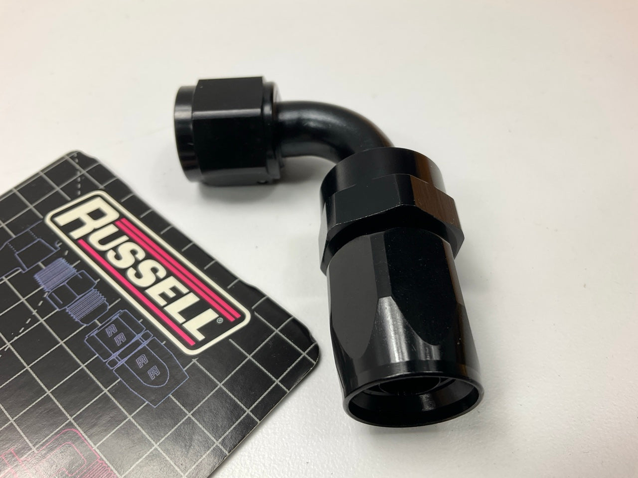 Russell 610175 Black 8-AN 90° Full Flow Hose End Fitting