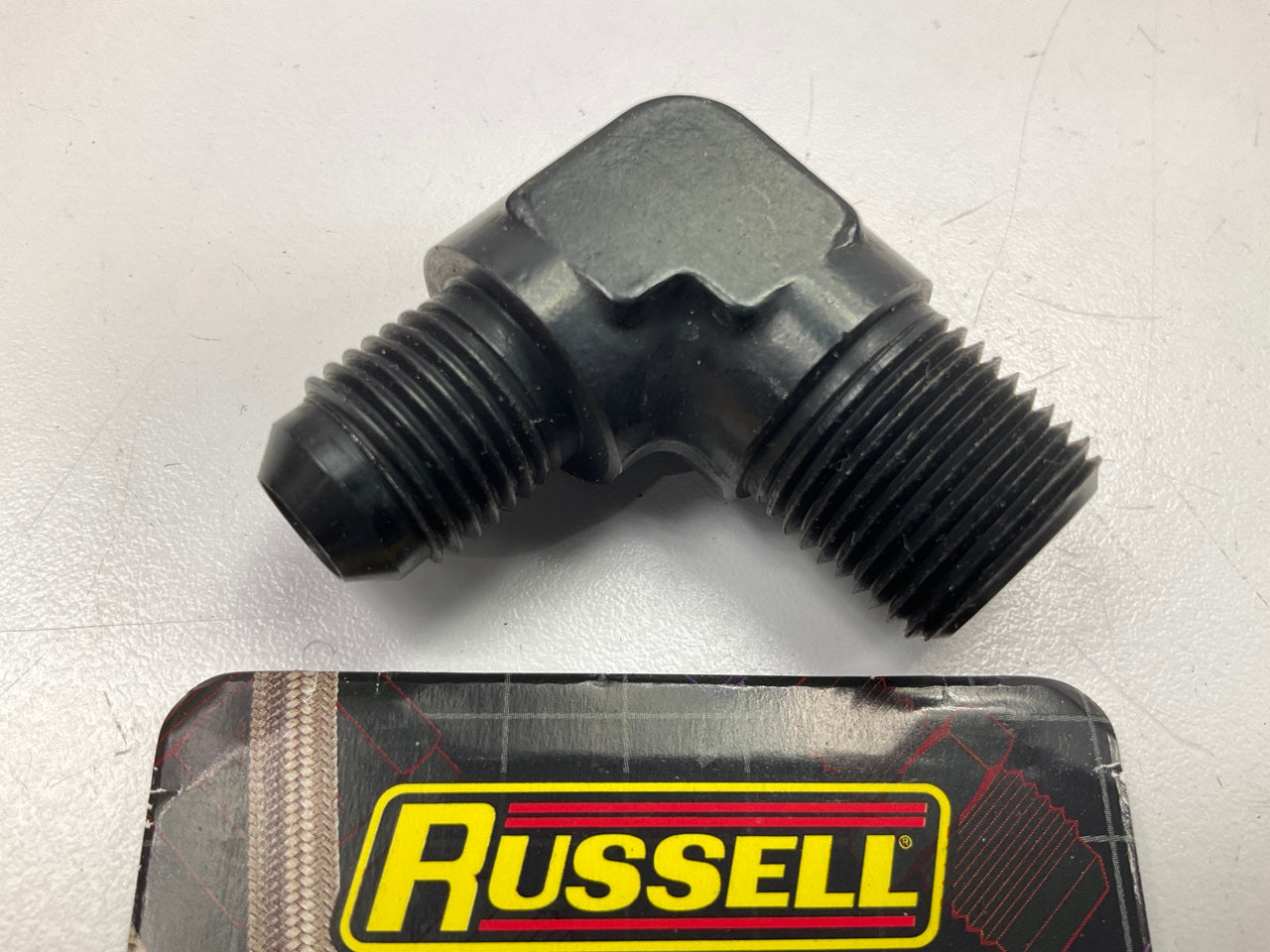 Russell 660843 -6 An To 3/8in NPT 90 Degree Flare To Pipe Adapter