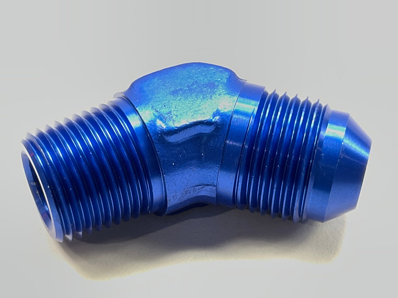 Russell 660960 8AN 45 Degree Flare To 3/8'' Pipe Adapter Fitting With Blue Finish