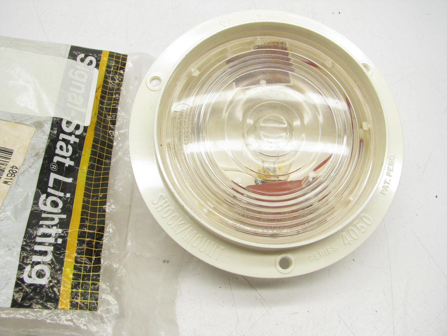 Signal-stat 4061W  4''  Clear Round, 1 Bulb, Back-Up Light