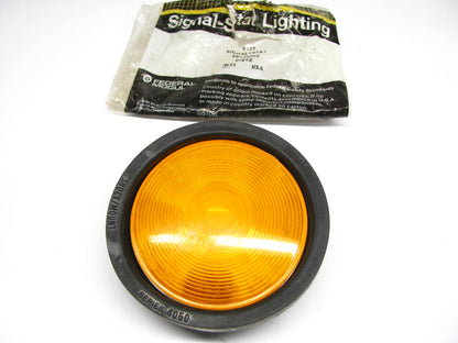 Signal-stat # 9127  4'' Round Yellow Tail Light W/ Grommet