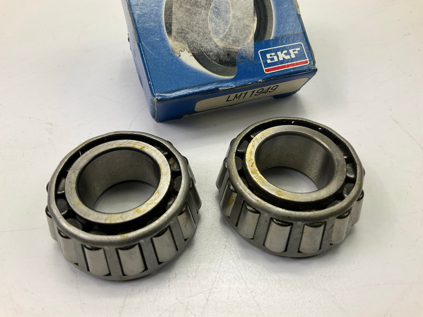 (2) SKF LM11949 Front Outer Wheel Bearing